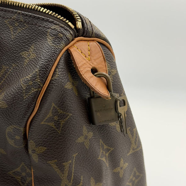 Louis Vuitton Monogram Speedy 25 Handbag